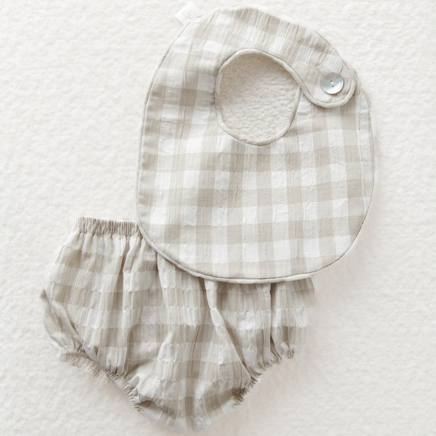 Conjunto de babero y bloomer